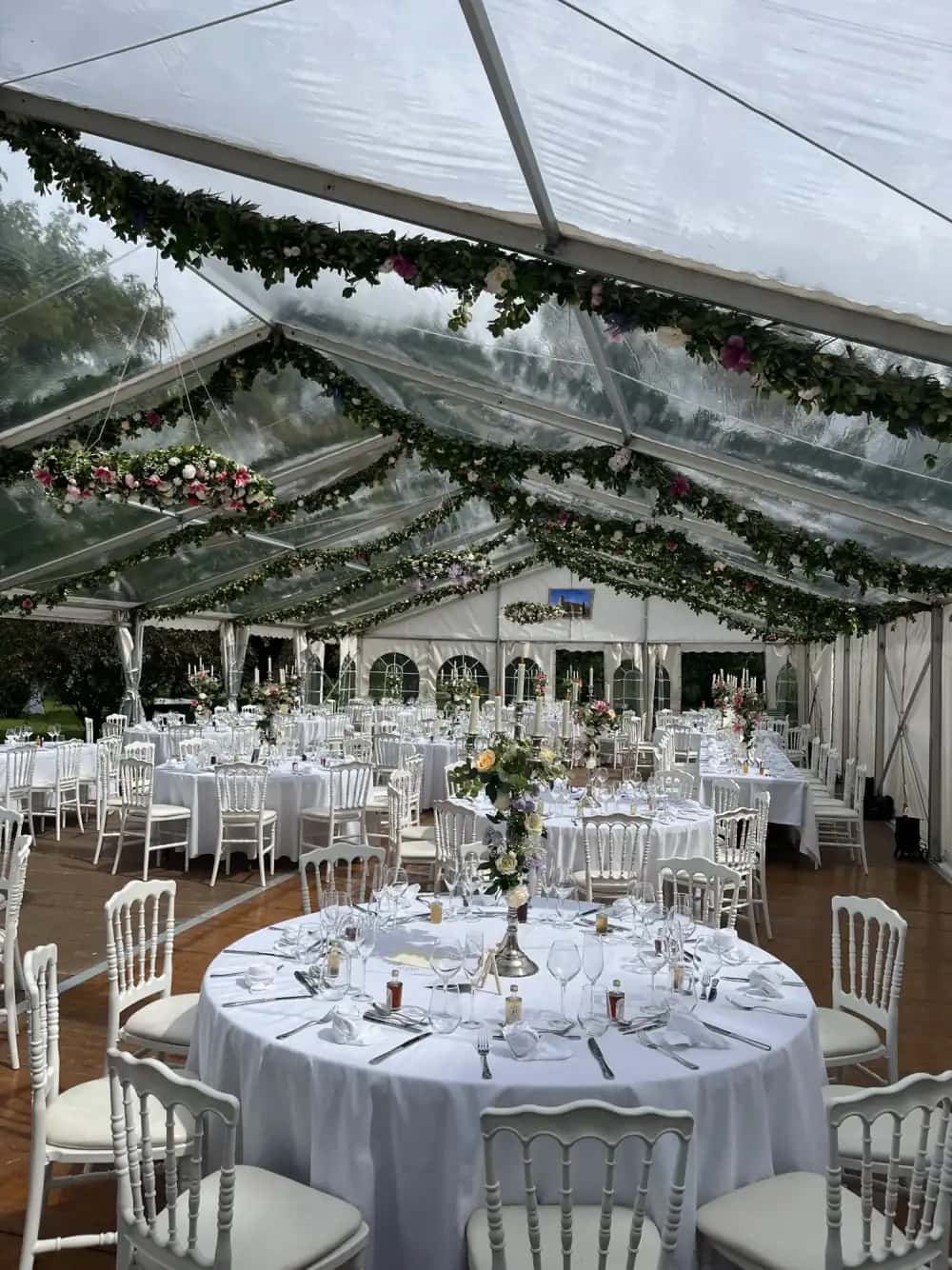 Floral crystal-tent wedding, 160 guests
