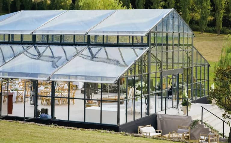 Cathedral Glasshouse Tent hire — event tent setup